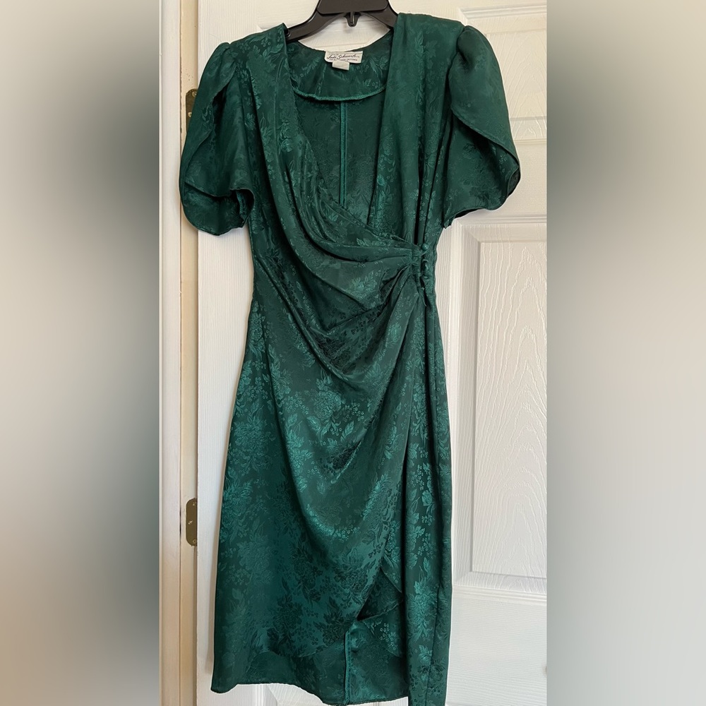 Wrap style dress.  Lightweight with shoulder pads.